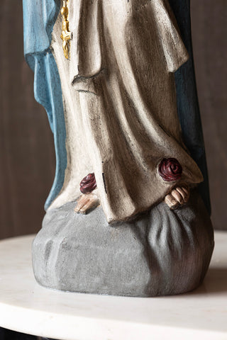 Close-up of the base of the Antique-Style Santa Maria Have Faith Ornament.