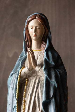 Close-up of the Antique-Style Santa Maria Have Faith Ornament.