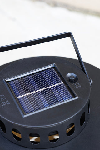 Close-up of the solar panel on the top of the Beautiful Dancing Birds Outdoor Solar Light.