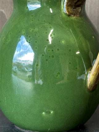 Evidence of the discolouration issue of the green vase jug.