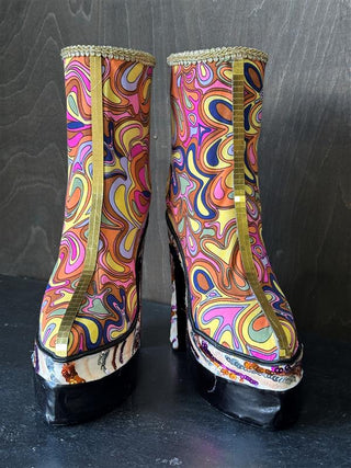 The Groovy Boots decorations front on with gold sequins.