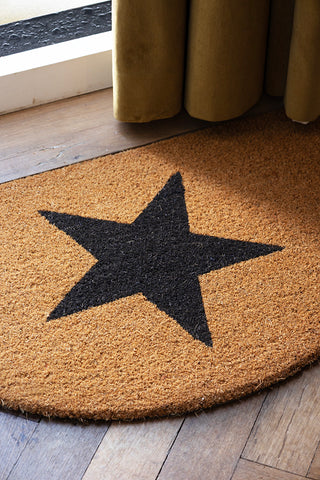 Close-up of the star design on the Half Moon Star Doormat.