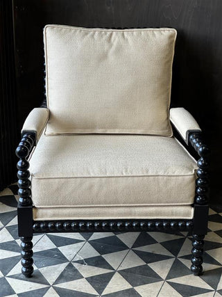 Front on view of the nautral bobbin chair with linen natural chair seats and black wood bobbin chair arms and legs.