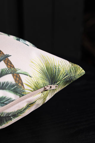 Detail shot of the zip of the Palm Print Outdoor Cushion.