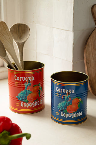 The Set Of 2 Flamenco & Orange Kitchen Storage Tins styled by a window, with wooden utensils, a chopping board and a red pepper.