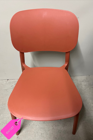 Front view of an orange chair with a grey background