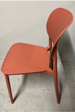 Full side view of orange chair