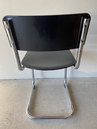 Full back view of the black retro chair