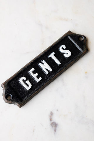 The Gents Door Hanging Sign displayed on a white marble surface.