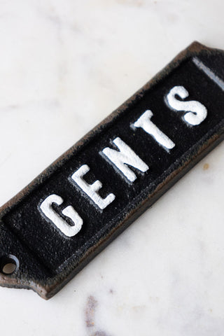 Detail shot of the Gents Door Hanging Sign, displayed on a white marble surface.