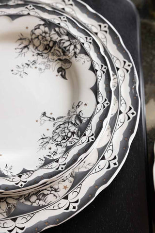 Close-up image of the 12-Piece Vintage-Style Floral & Star Dinner Set.