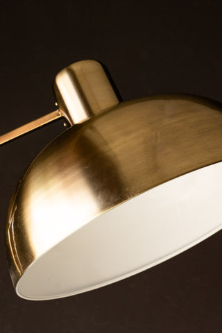 Close-up of the top of the Adjustable Gold Task Floor Lamp.