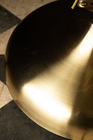 Close-up of the base of the Adjustable Gold Task Floor Lamp.