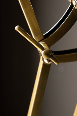 Detail shot of the fixture on the Adjustable Gold Task Floor Lamp.