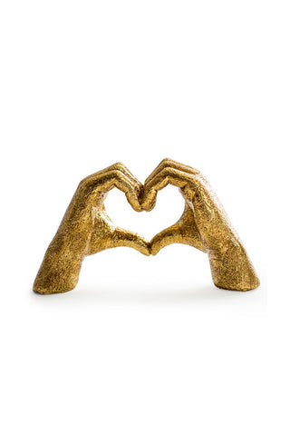 Cutout of the Antique Gold Heart Hands Ornament on a white background.