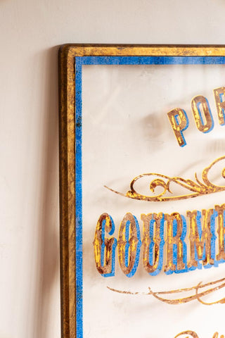 Detail shot of the corner of the Antique-Style Gold Framed Portobello Gourmet Wall Art.