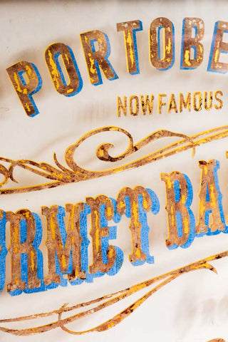 Close-up of the text on the Antique-Style Gold Framed Portobello Gourmet Wall Art.