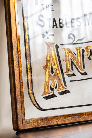 Close-up of the Antique-Style Gold Framed Stables Market Wall Art.