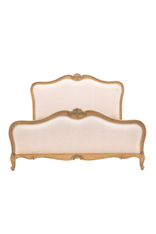 Cutout of the Antique-Style Luxury Linen & Wooden Bedframe on a white background.