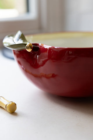 Close-up of the stem and leaf detail on the Italiana Chic Apple Serving Bowl.