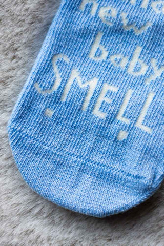 Detail shot of the New Baby Smell Baby Socks.