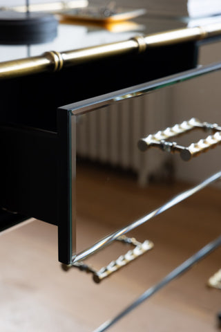 Detail shot of the Mirrored Bamboo Effect Chest Of Drawers with one of the drawers open.