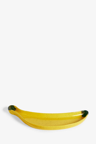 Cutout image of the Banana Serving Plate on a white background, seen from a side view.
