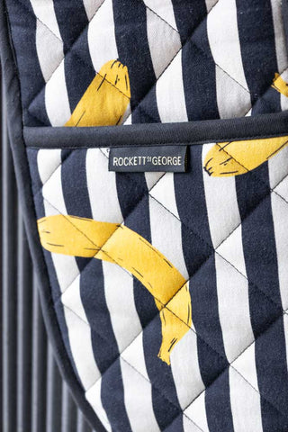 Close-up of the design on the Banana Black & White Stripe Oven Gloves.