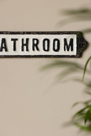 Close-up of the Bathroom Door Hanging Sign on the wall.