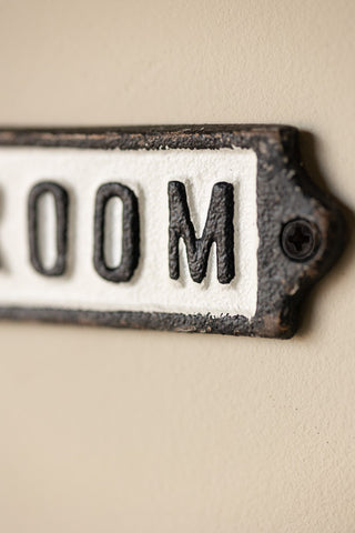 Close-up of one side of the Bathroom Door Hanging Sign.