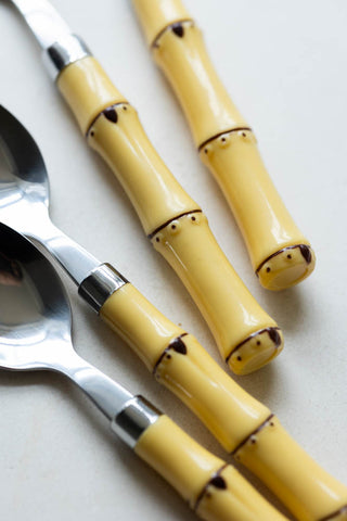 Close-up image of the handles of the Beautiful 16-Piece Bamboo Design Cutlery Set.