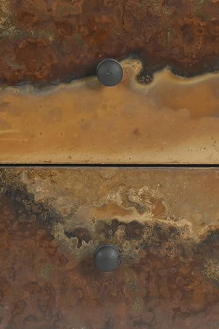 Close-up of the front of the drawers on the Beautiful Burnished Metal Bedside Table.