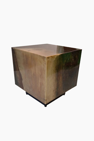 Cutout of the Beautiful Burnished Metal Side Table on a white background.