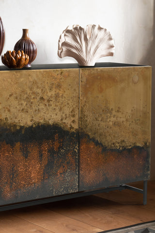 Close-up of the Beautiful Burnished Metal Sideboard, with ornaments and vases displayed on top.