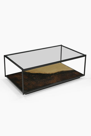 Cutout of the Beautiful Burnished Metal & Glass Coffee Table seen from an above angle.