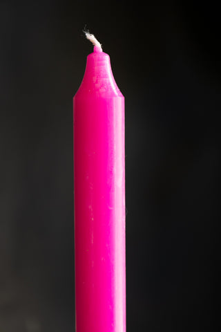 Beautiful Dinner Candle - Hot Pink against dark wall detail