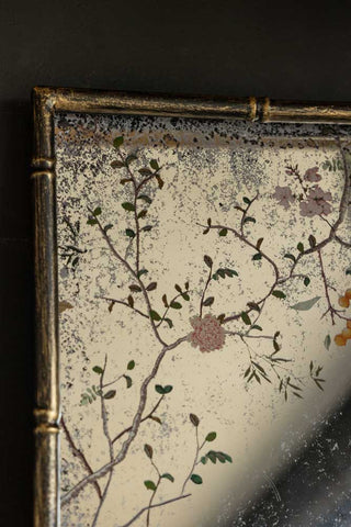 Close-up of the top left-hand corner of the Beautiful Pink Chinoiserie Decorative Mirror.