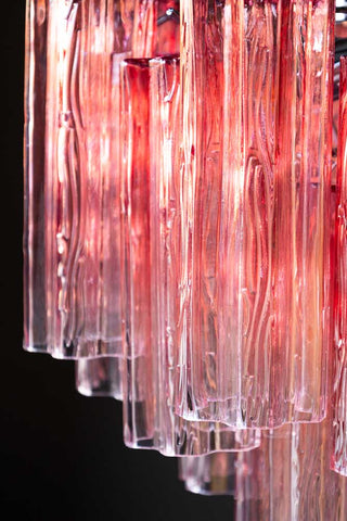 Close-up of the Beautiful Waved Glass Chandelier in Pink.