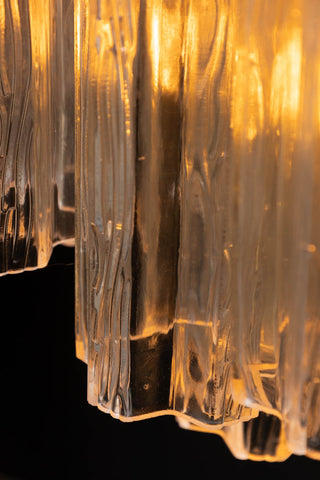 Close-up of the bottom of the Beautiful Waved Glass Chandelier in Clear.