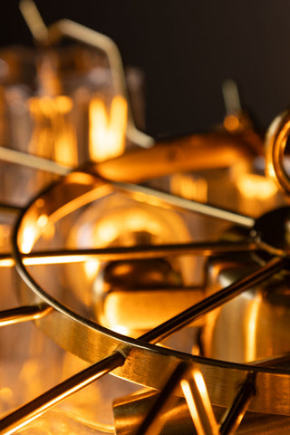 Close-up of the metal at the top of the Beautiful Waved Glass Chandelier in Clear.