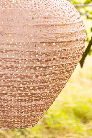 Close-up of one side of the Bell Shaped Peach Outdoor Garden Lantern.