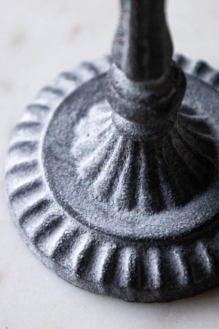 Close-up of the base of the Short Black Antique Zinc Style Candlestick Holder.