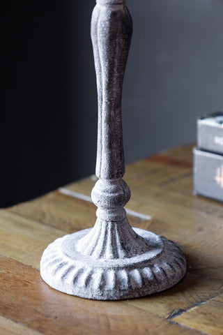 Close-up of the base of the Tall Black Antique Zinc Style Candlestick Holder.