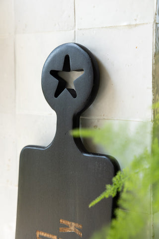 Close-up of the star detail on the Black Kitchen Disco Slim Serving Board.