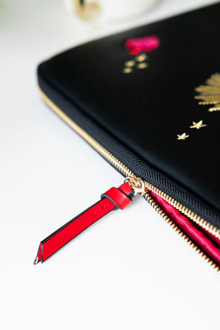 Detail shot of the zip on the Black Milagro Heart Laptop Case.