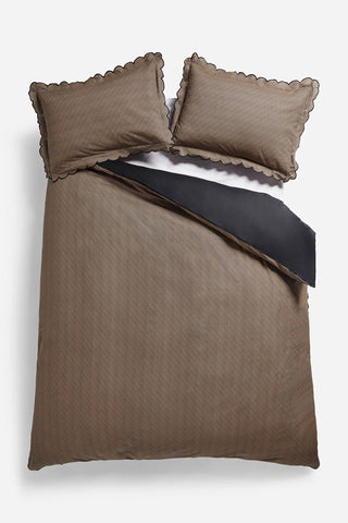 Cutout of the Black Pencil Stripe Scalloped Edge Bedding Set on a white background.