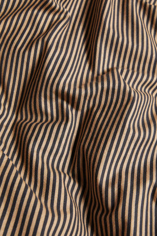 Detail shot of the Black Pencil Stripe Scalloped Edge Bedding Set.