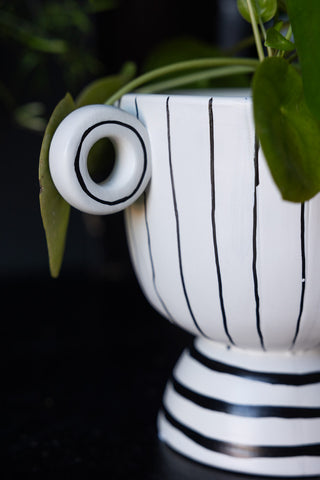 Close-up of one side of the Black & White Stripe Vase with Handles.