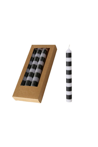 Cutout of the Black & White Striped Taper Candles - Pack Of 4 on a white background.