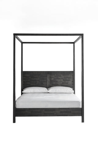 Cutout of the Boho-Inspired Boutique Four Poster Bed on a white background.